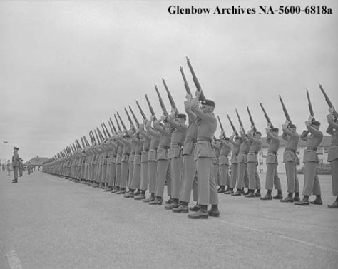 1st Battalion fires feu de joie on Victoria Day 1957 at Currie Barracks, Calgary, Alberta [Photo courtesy of Glenbow Museum NA-5600-6818a]