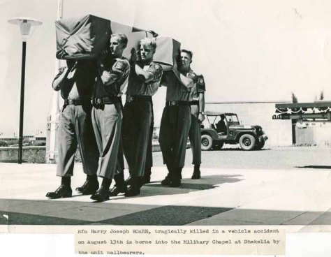 Hoare, Perry coffin into chapel