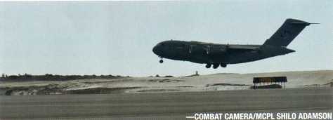 The homecoming:A CC-177 Globemaster escorted by two CF-18 Hornets carries members returning from the last mission in Afghanistan to the Ottawa International Airport on March 18, 2014.