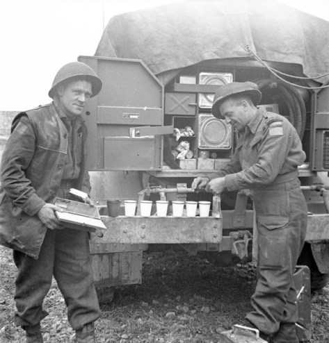 Rfn JR Ramage,WH Maharg QOR Testing fresh water Bretteville-Orgueilleuse 20June44