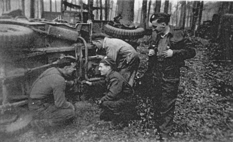 Working on a jeep La Capell France 11 Sept 1944
