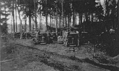 Working on jeeps in the woods 11 Sept 1944 La Capell France