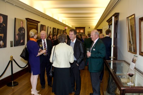 Guests mingle at the QOR Portraits Exhibit launch reception.